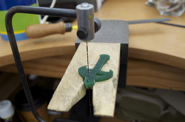 Refining the shape with a jewellers saw.