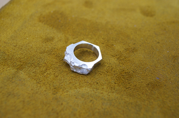 Exceptional cast silver ring.